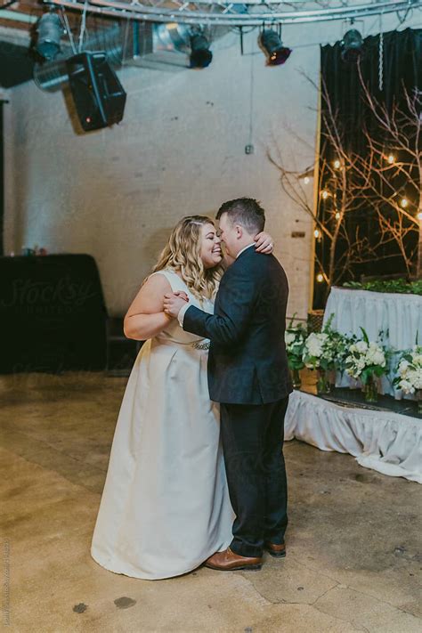 Husband And Wife Sharing First Dance By Stocksy Contributor Leah