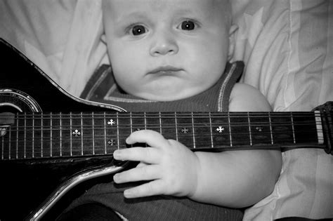 Baby Playing Guitar Is Funny Amba Took These Ryan Looks O Flickr