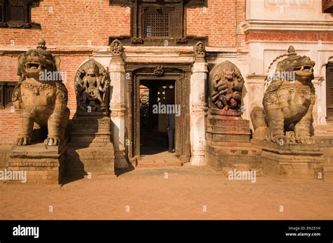 Nepal Kathmandu Bhaktapur Lion Statues Outside National Art Museum In Durbar Square Stock