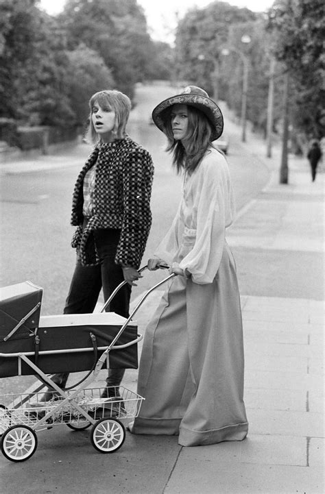 rare photos from 1971 show david bowie and his ex wife taking their son zowie for a walk bored