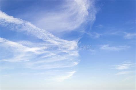 Scenic Skyscape With Fluffy Cirrus And Stratus Clouds In The