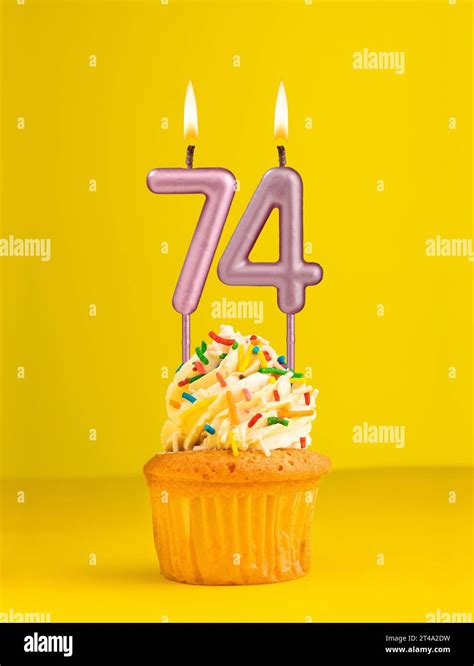 Number 74 Candle Birthday Card Design In Yellow Background Stock