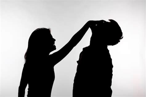 Premium Photo Silhouette Of A Woman Slapping A Man