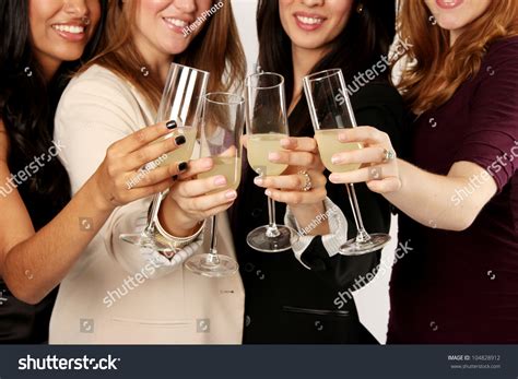 Four Ladies Celebrating Drinks Stock Photo Edit Now 104828912
