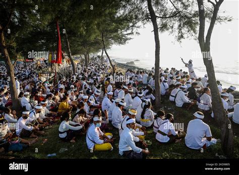 Balinese Hindu Devotees Gather As They Perform Prayers During The Melasti A Purification