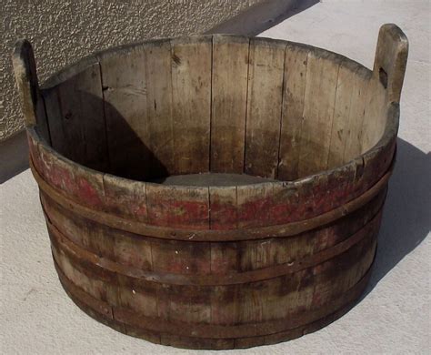 | this makes it resemble a type of brown marble. 25" X 17" ANTIQUE PRIMITIVE HANDLED WOODEN WASH TUB WITH ...