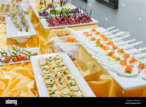 Catering Table With Dishes And Snacks On The Business Event In The