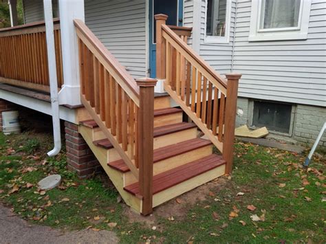 They have to be sturdy and larger in size to make it easier to step on them. Cedar & Mahogany Porch Stairs - Traditional - Porch ...
