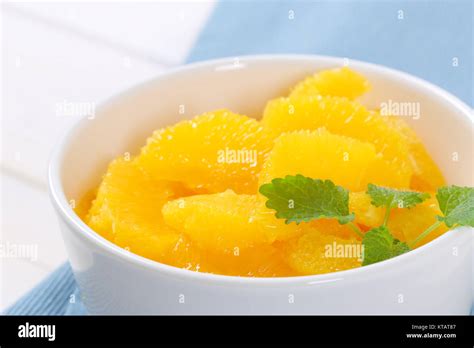 Slices Of Peeled Orange Stock Photo Alamy
