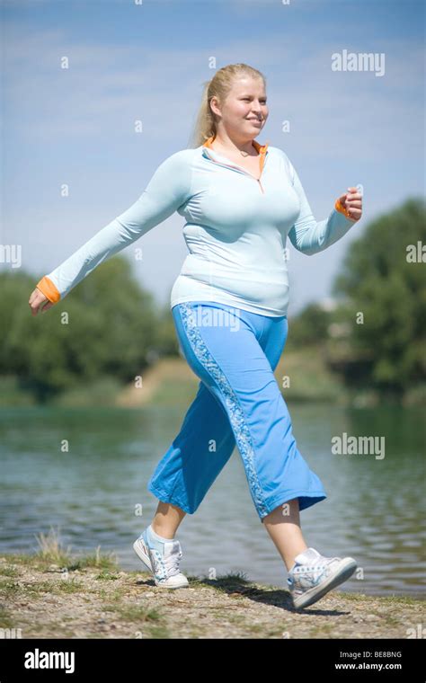 Young Fat Woman Walking Stock Photo Royalty Free Image 26000396 Alamy