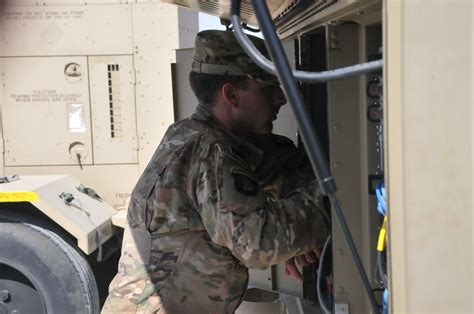 Task Force Strike Signal Soldiers Maintain Communication Lines