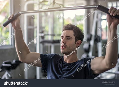 Handsome Weightlifter Lifting Barbells Squats Smith Stock Photo Edit