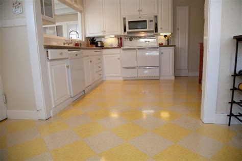 Old vinyl tiles removal from floor in a room or kitchen. Luxury Vinyl Floors Gallery | Slaughterbeck Floors, Inc. | Campbell, CA