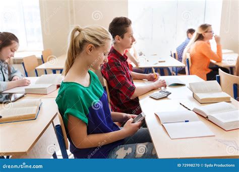 Student Girl With Smartphone Texting At School Stock Photo Image