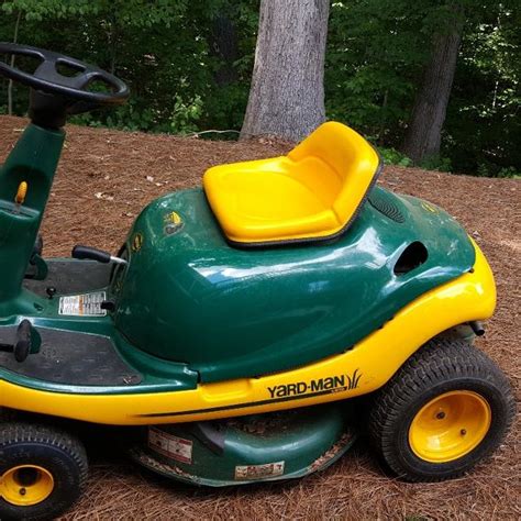 Discover The Powerful Engine In The Yard Bug Riding Lawn Mower
