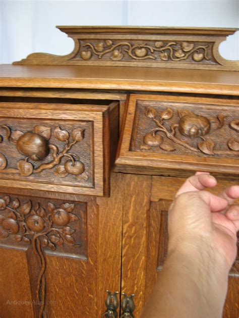 Arts And Crafts Cupboard With Carved Trees Antiques Atlas