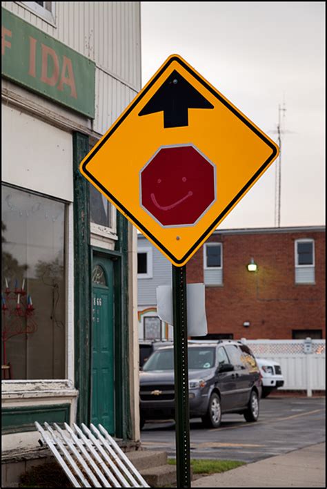 A Stop Sign With A Happy Face Photograph By Christopher Crawford