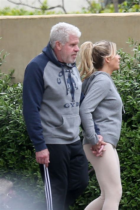 sons of anarchy star ron perlman 70 holds hands with girlfriend allison dunbar 47 after