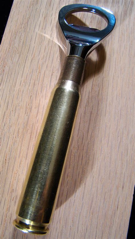 This shore memories sea shell bottle opener makes a unique favor for guests. A bottle opener made from a 50 caliber shell casing ...