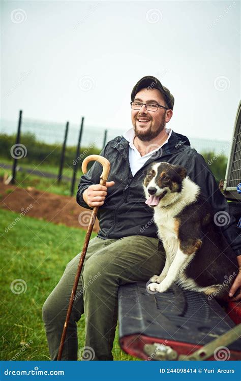 We Go Everywhere Together Portrait Of A Cheerful Young Farmer And His