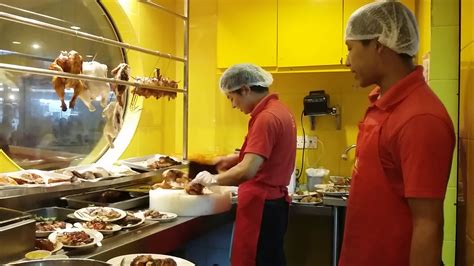 De the chicken rice shop. The chicken rice shop restaurant in working time / KL ...