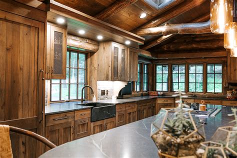 To tone it down a bit, consider a medium tone like sable, caraway or even graphite. Distressed Rustic Hickory kitchen cabinets - Alpine ...