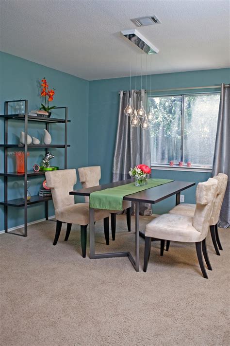 Blue Mid-Century Modern Dining Room With Neutral Velvet Chairs | HGTV