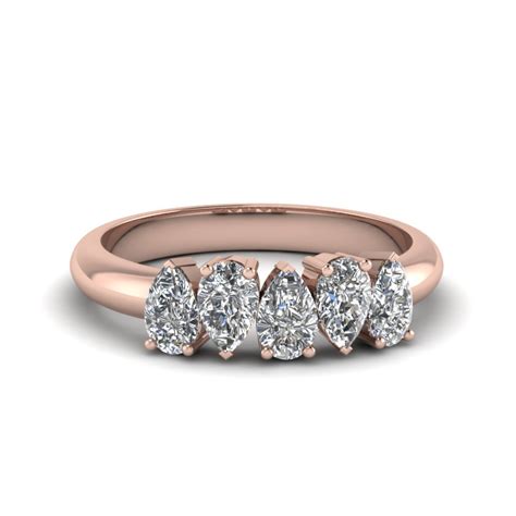 In 1886, tiffany introduced the engagement ring as we know it today. 5 Stone Pear Shaped Diamond Band In 14K Rose Gold ...