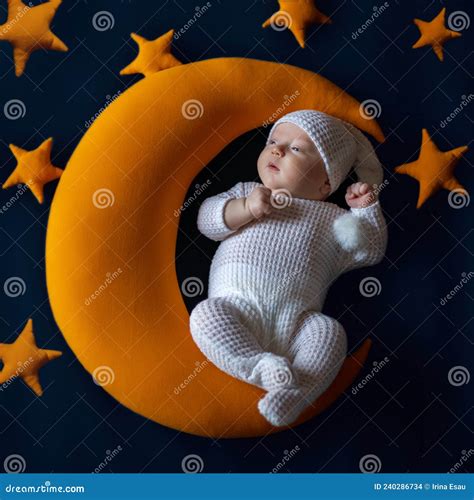 Cute Baby Sleeps On A Moon Surrounds By Stars Stock Photo Image Of