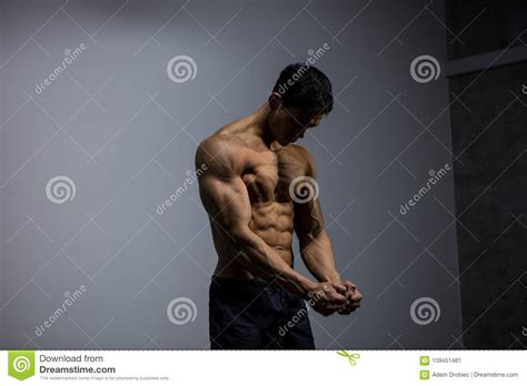 Asian Fitness Model Flexing Muscles Stock Image Image Of Camera