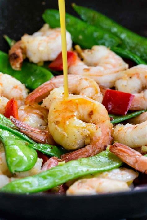 Add the snap peas, carrot, and pepper and toss to combine. Easy Shrimp Stir Fry Recipe - Jessica Gavin