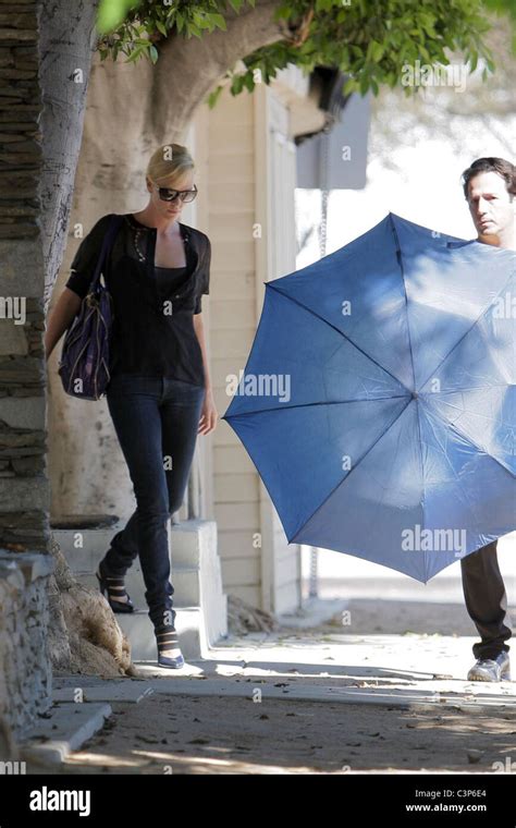 Charlize Theron Leaves A Gym With Her Personal Trainer Hi Res Stock
