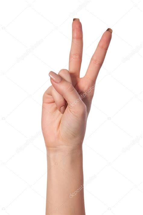 Hand With Two Fingers Up In The Peace Or Victory Symbol Stock Photo By