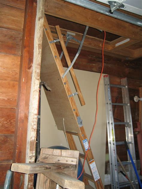 Can the door be covered with 1/2 fire rated sheetrock. Garage loft & attic stairs | Flickr - Photo Sharing!