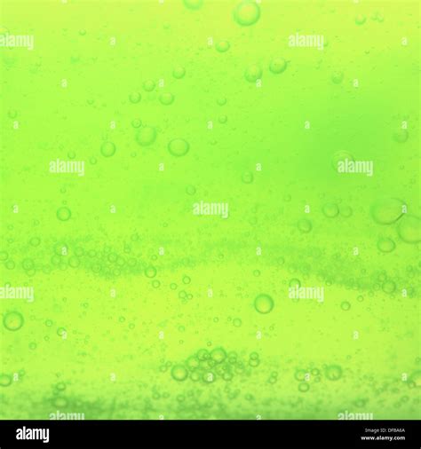 Green Abstract Blurred Liquid Background With Soap Bubbles Square