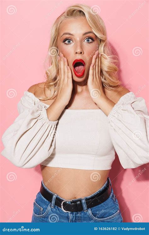 Image Closeup Of Shocked Blonde Woman With Open Mouth Expressing Wonder