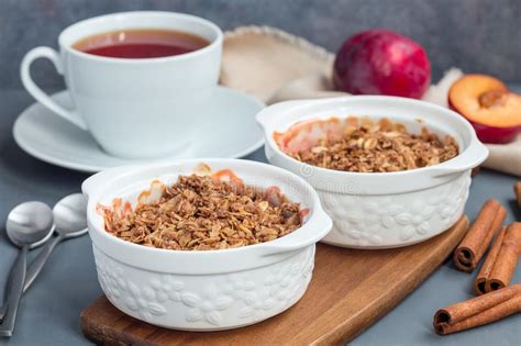 Plum Crumble Pie Or Plum Crisp With Oats And Spices In Baking D Stock