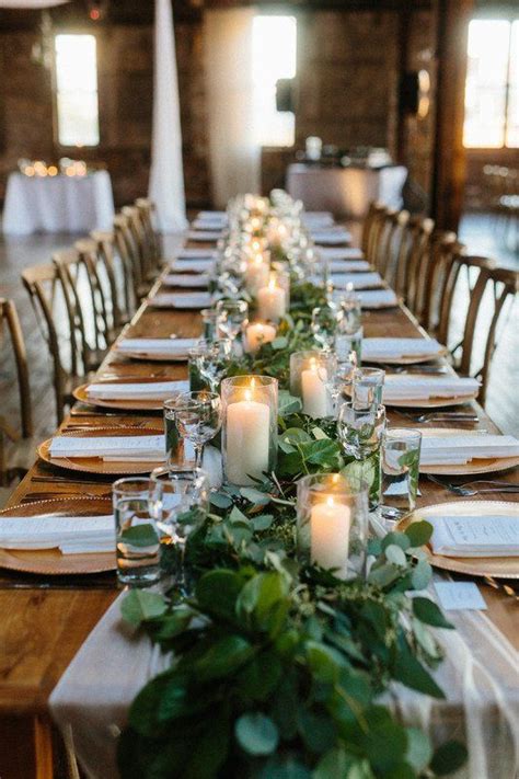 Greenery Garland Wedding Centerpiece Idea With Candles Whimsy Weddings