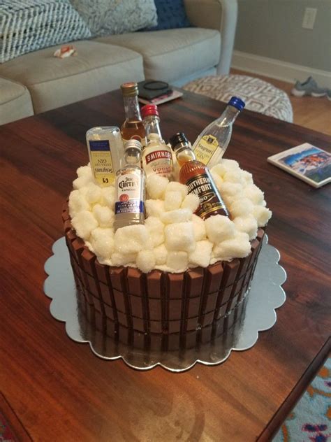 This boozy cake recipe is a delicious twist on a classic bundt cake. 21st Birthday Cake! Barrel of (mini) liquor bottles on ice | 21st birthday cake alcohol
