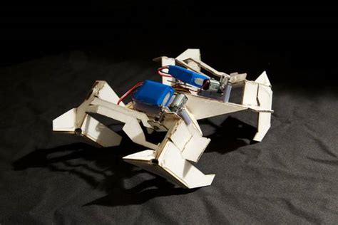 Transforming Origami Inspired Robot Folds Its Own Legs Into Shape