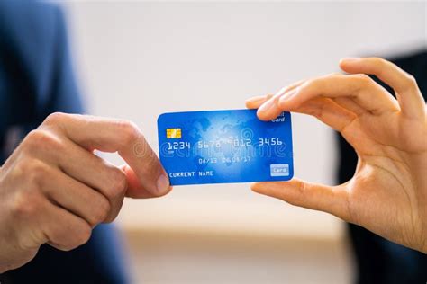 Person Giving Credit Card To Businesswoman Stock Photo Image Of