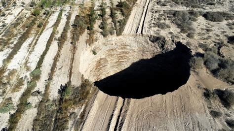 Giant Sinkhole With ‘a Lot Of Water Abruptly Opens Up Close To Copper
