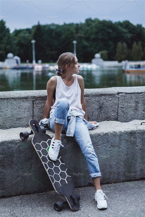 Girl On A Skateboard In The City Skateboard Skateboard Fashion