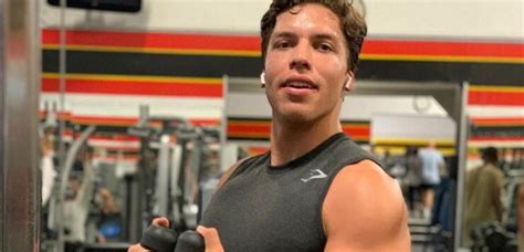 arnold schwarzenegger s lookalike son joseph baena tries to crack an egg with his bicep