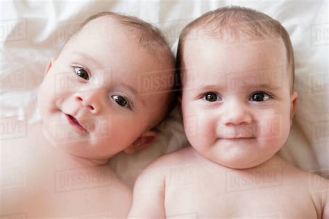 Portrait Of Caucasian Twin Baby Girls Stock Photo Dissolve