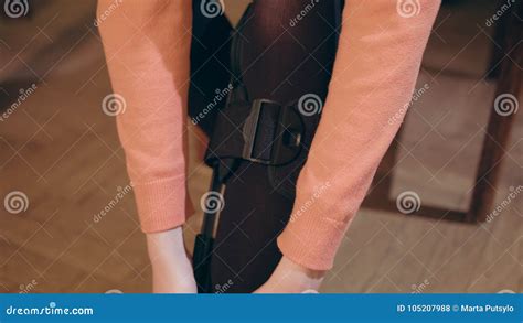 Lady Putting On Supportive Leg Brace Stock Photo Image Of Hands