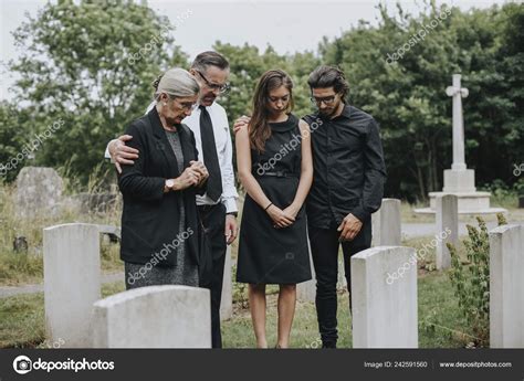 Family Giving Last Goodbyes Cemetery Stock Photo by ©Rawpixel 242591560