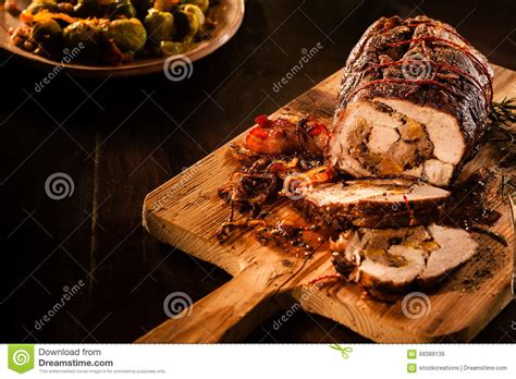 Roasted Pork Sliced With Bacon On Cutting Board Stock Image Image Of