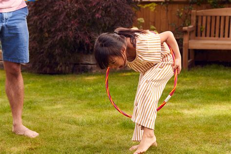 12 Easy Hula Hoop Games For Kids Empowered Parents