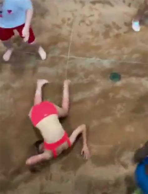 Shocking Moment Drunk Bikini Clad Woman Is Knocked Out After Line